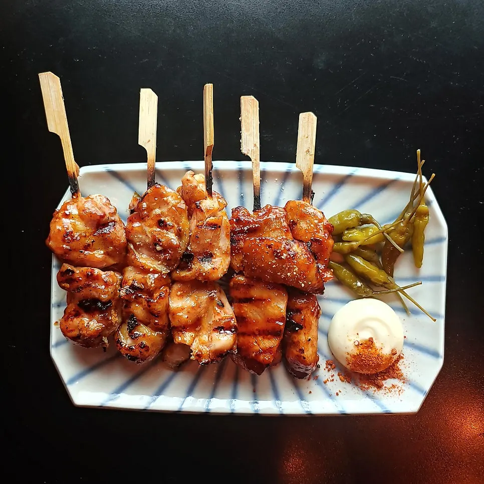Plate of chicken skewers at Nani Byeolgwan