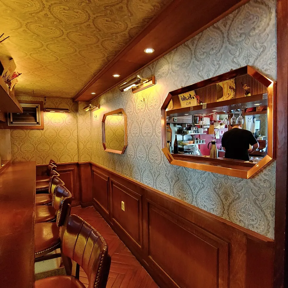 First-floor bar tables for solo drinking at Nani Byeolgwan