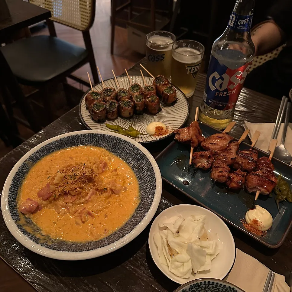 A plate of pork belly-scallion skewers at Nani Byeolgwan