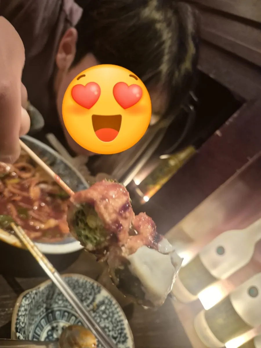 Pork belly scallion skewer dipped in the seafood udon sauce