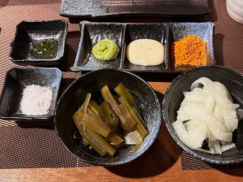 Basic side dishes and sauces set on the bar table