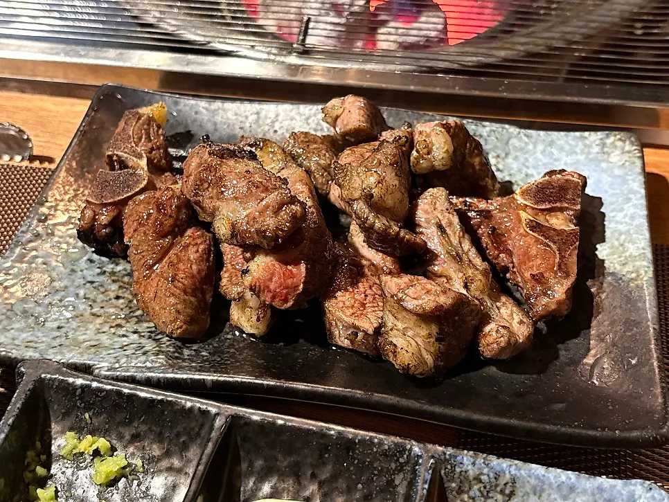 Close-up of expertly grilled lamb ribs