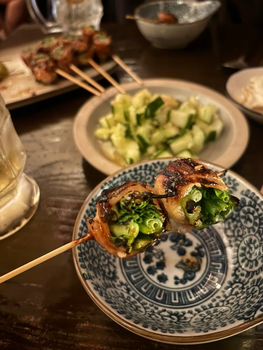 Pork belly scallion skewers served with mayonnaise