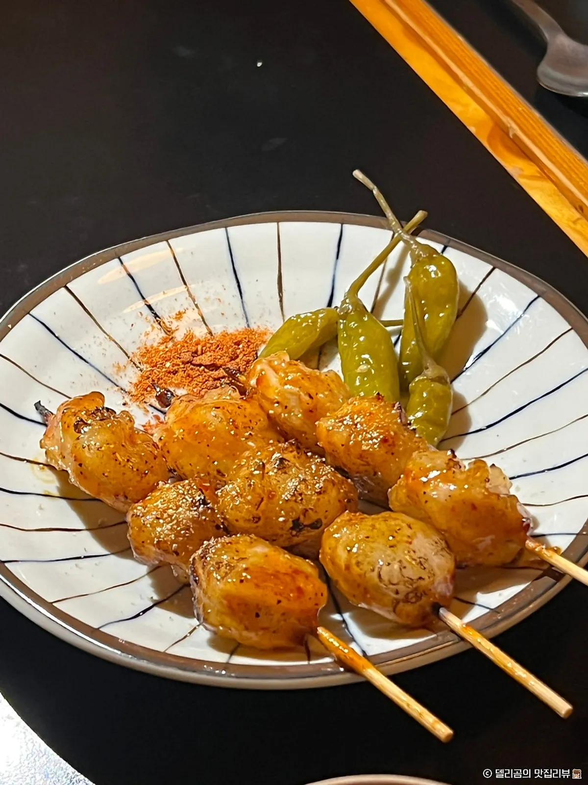 Golden-grilled daechang skewers at Nani Byeolgwan