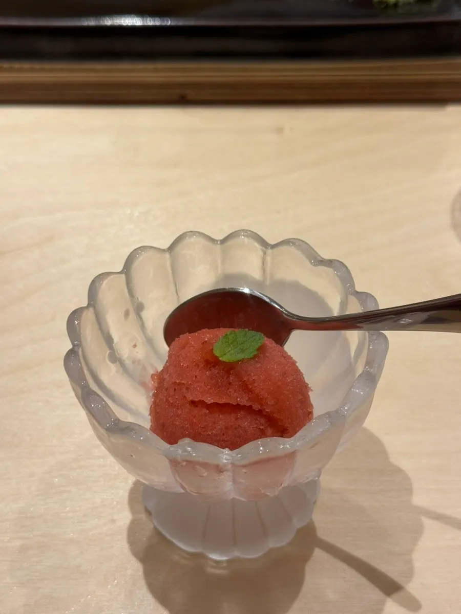Strawberry sorbet topped with apple mint