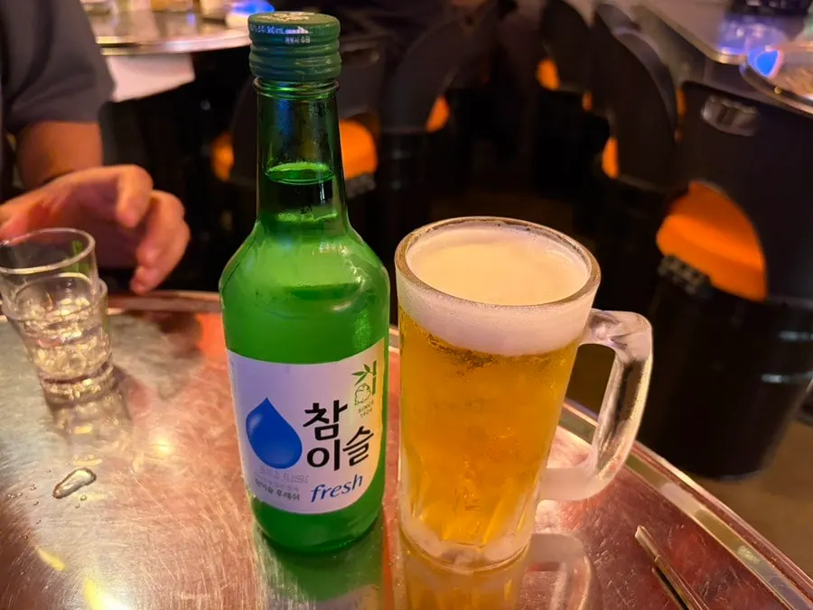 Menu board and drink prices at Yeokjeon Pojangmacha