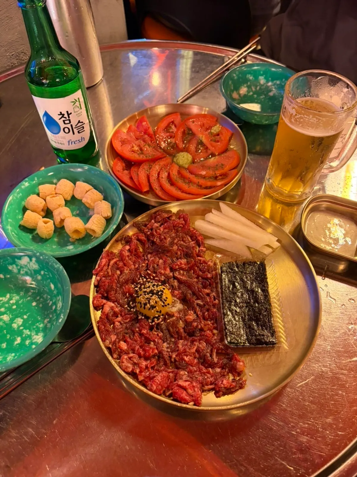 Group shot of honey tomato and hanwoo beef tartare