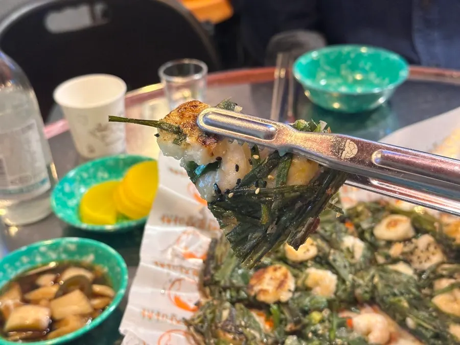 Freshly served scallop shrimp scallion pancake