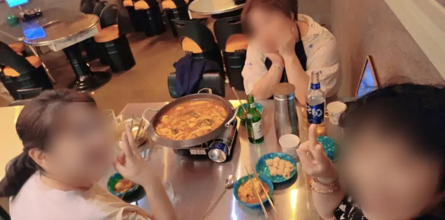 Table spread with dakdoritang and dumplings together