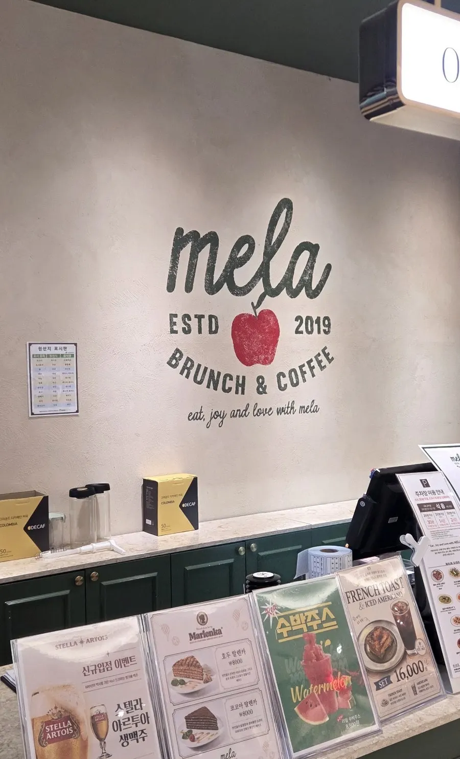 Order counter at the entrance of Mela Times Square