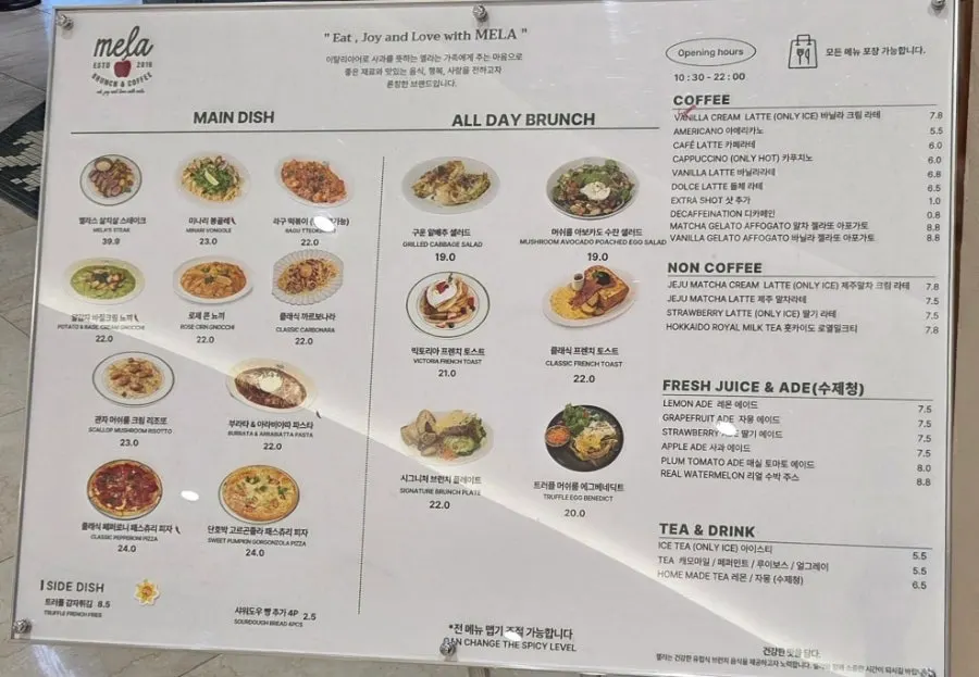 Mela menu board split into main dishes and all-day brunch
