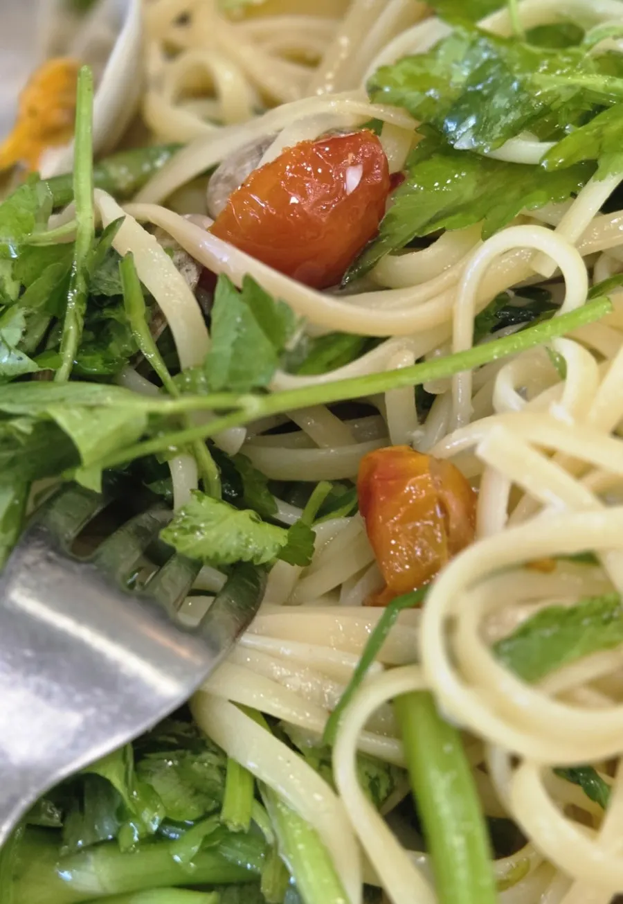 Minari vongole pasta generously topped with minari