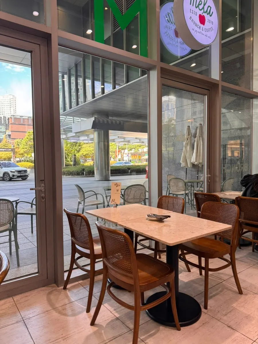 Generously spaced tables and seating at Mela Times Square