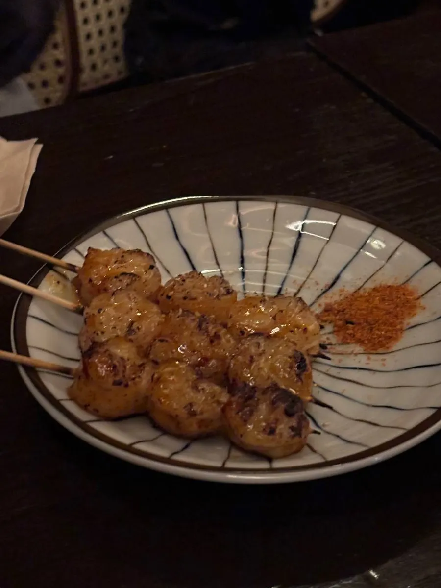 Nearly finished plate of chicken skewers