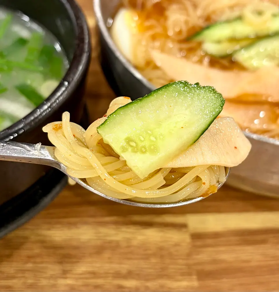 Mul milmyeon with cucumber and radish kimchi added