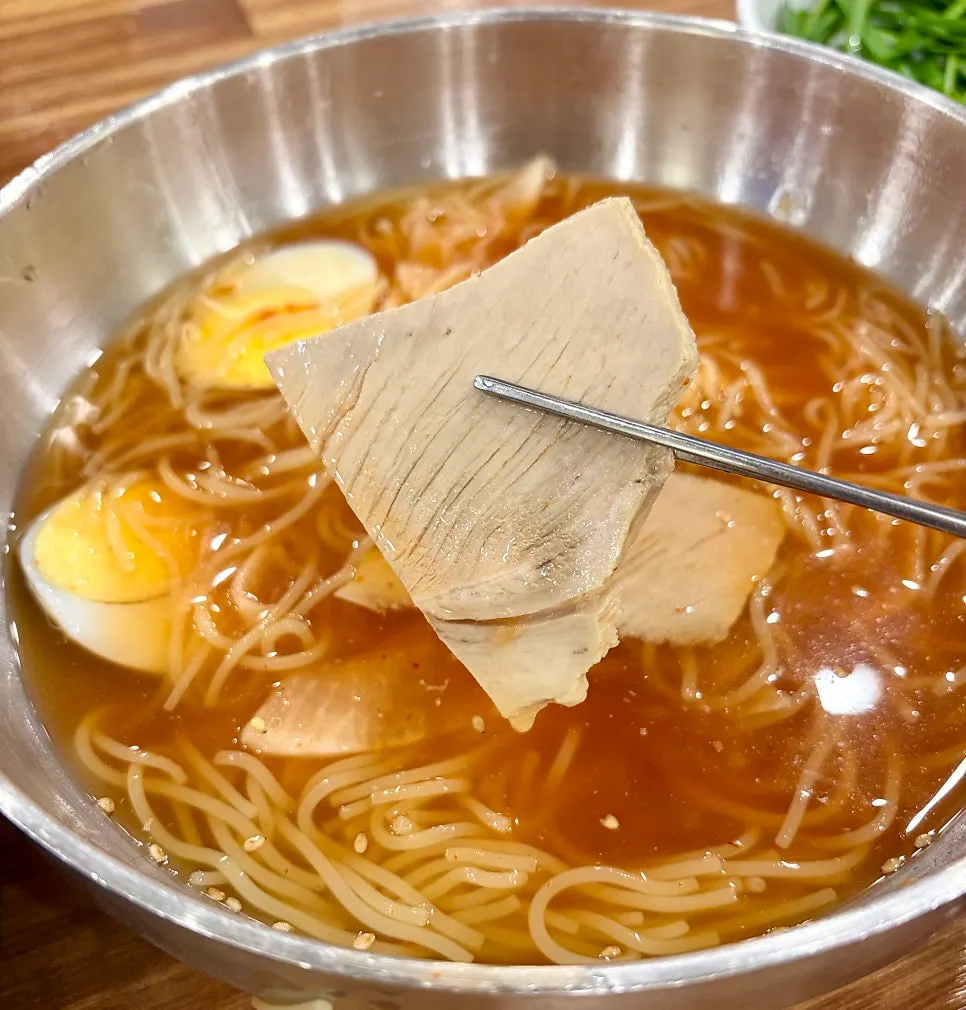 Meat pulled out from the milmyeon broth