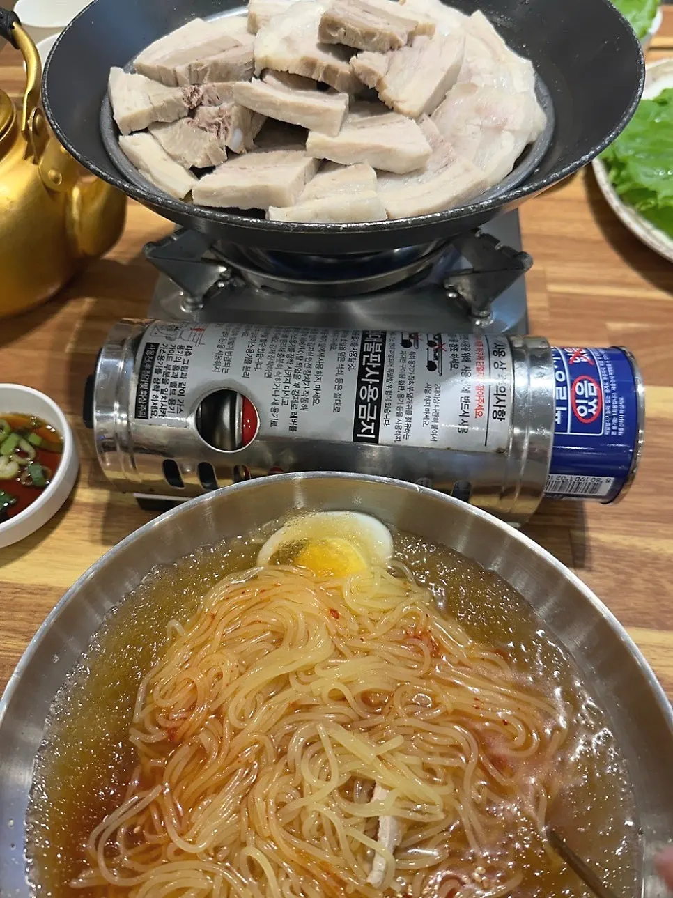 A bowl of milmyeon showing the homemade noodles