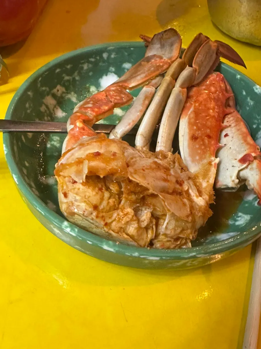 A bite of clam soaked in broth