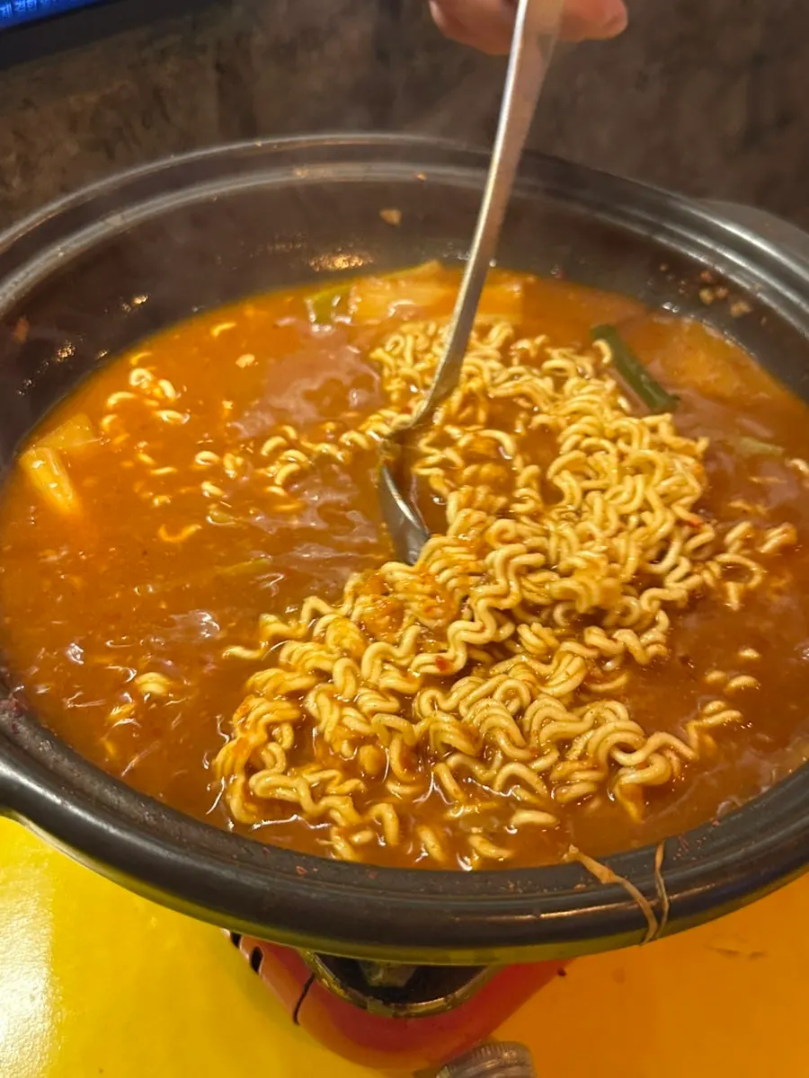 Crab stew with ramyeon noodles added