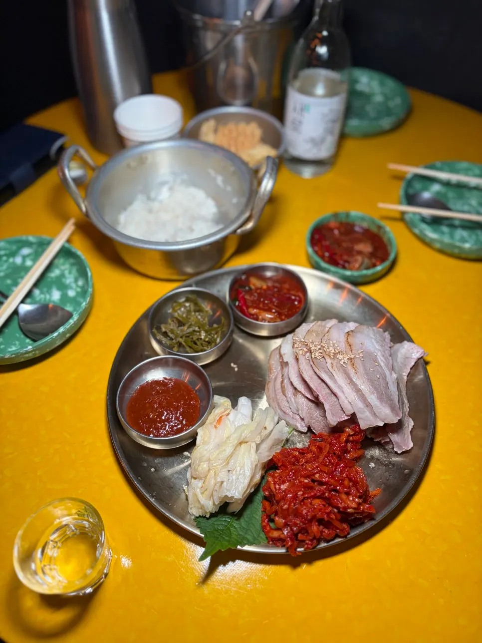 Toasting with a bottle of soju