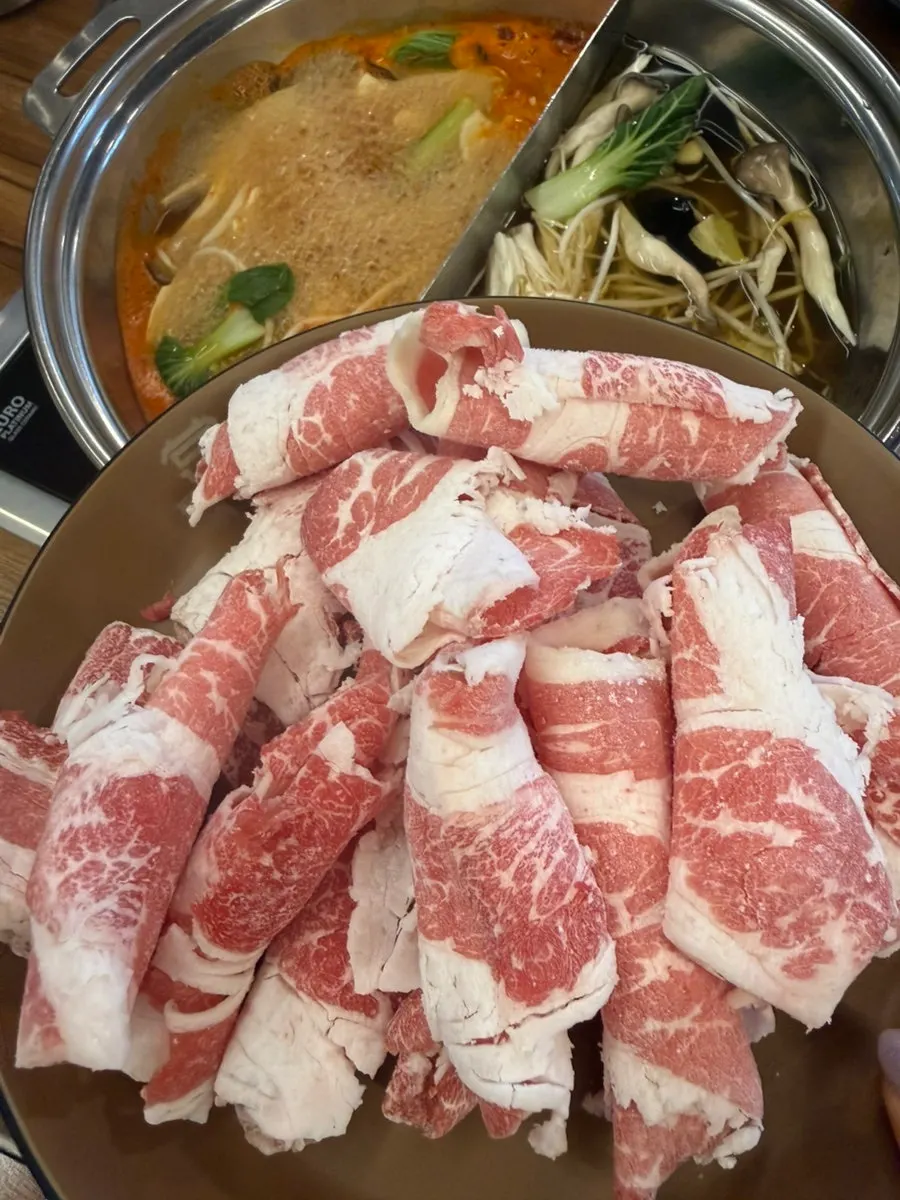 A plate of all-you-can-eat shabu-shabu meat