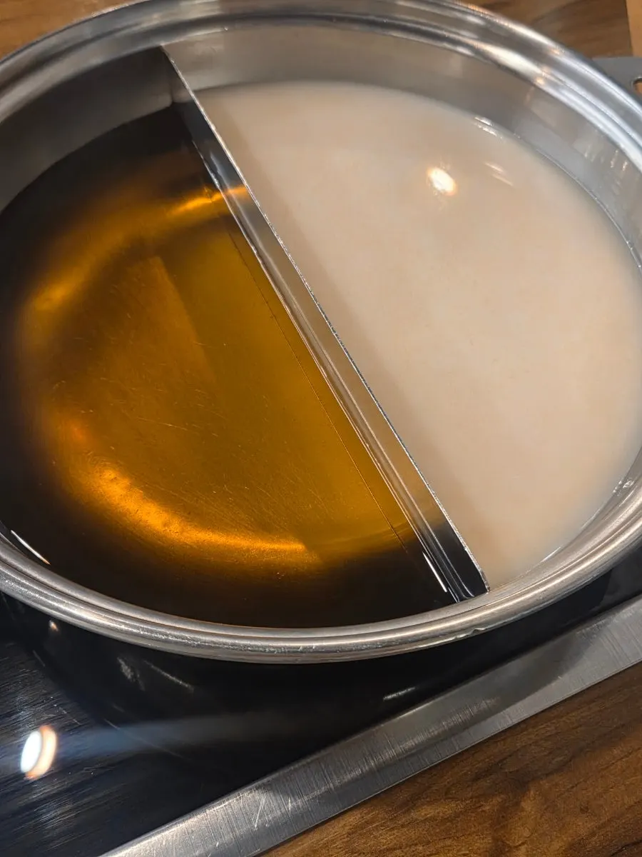 Preparing shabu-shabu after the cypress-steamed meal