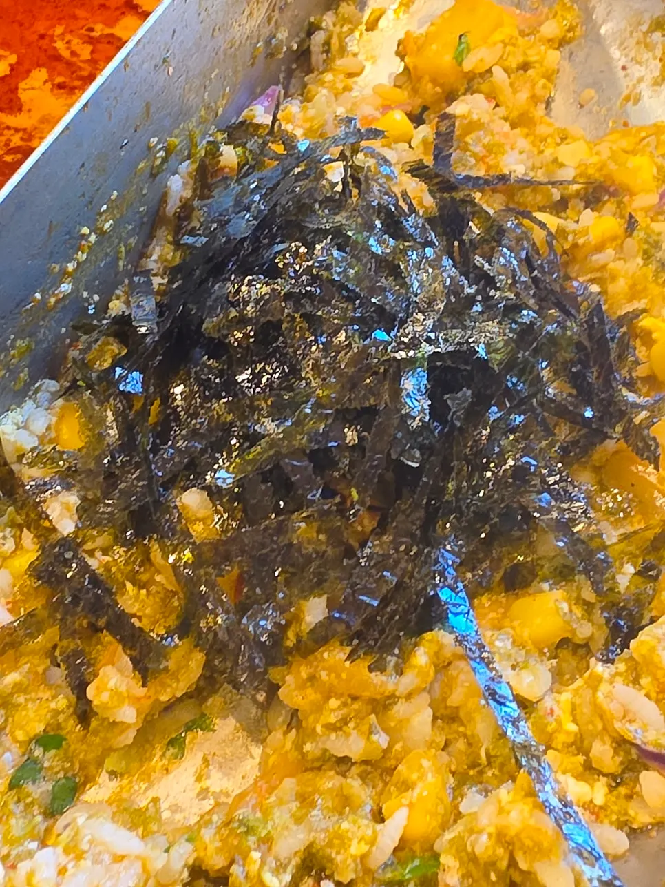 Cooking juk with Vietnamese spring roll vegetables