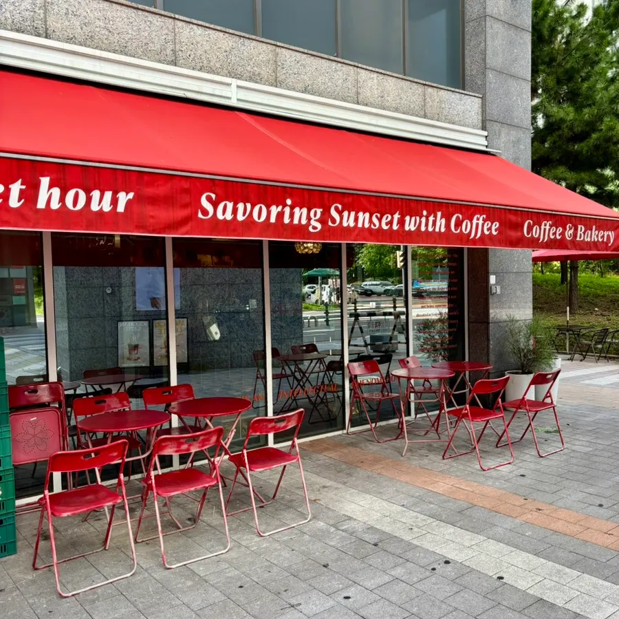 5PM sunset hour storefront and signage