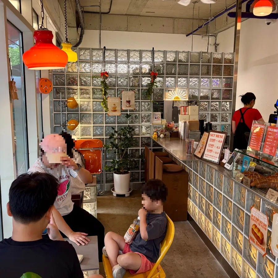 Café terrace scene with customers seated