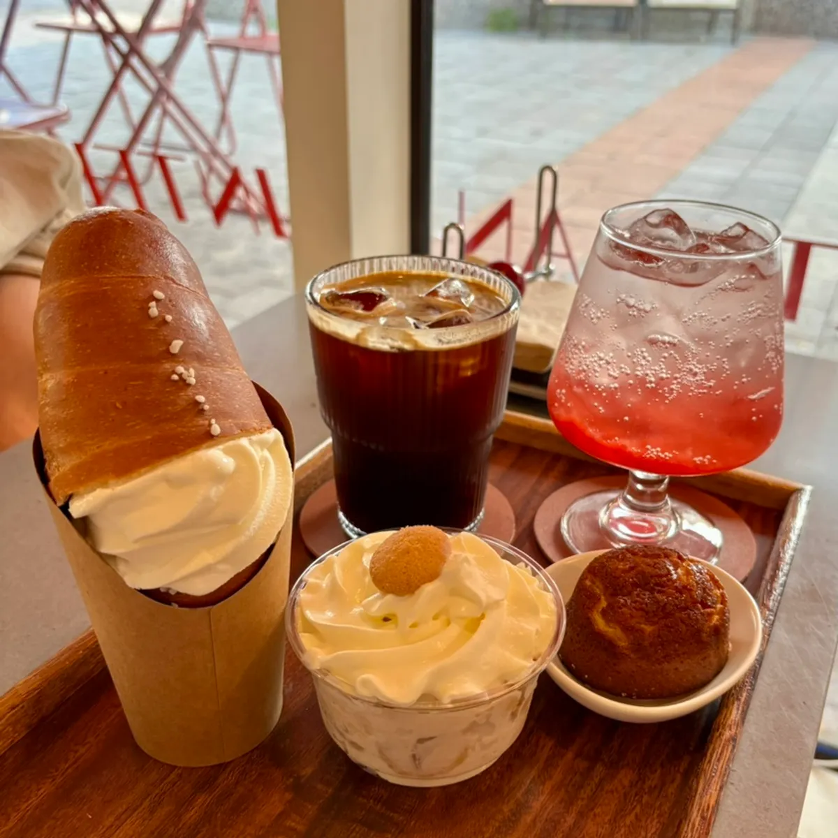 Table with ice cream salt bread and drinks