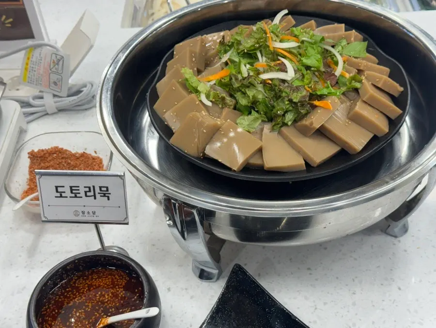 Buffet zone with pasta and tofu kimchi