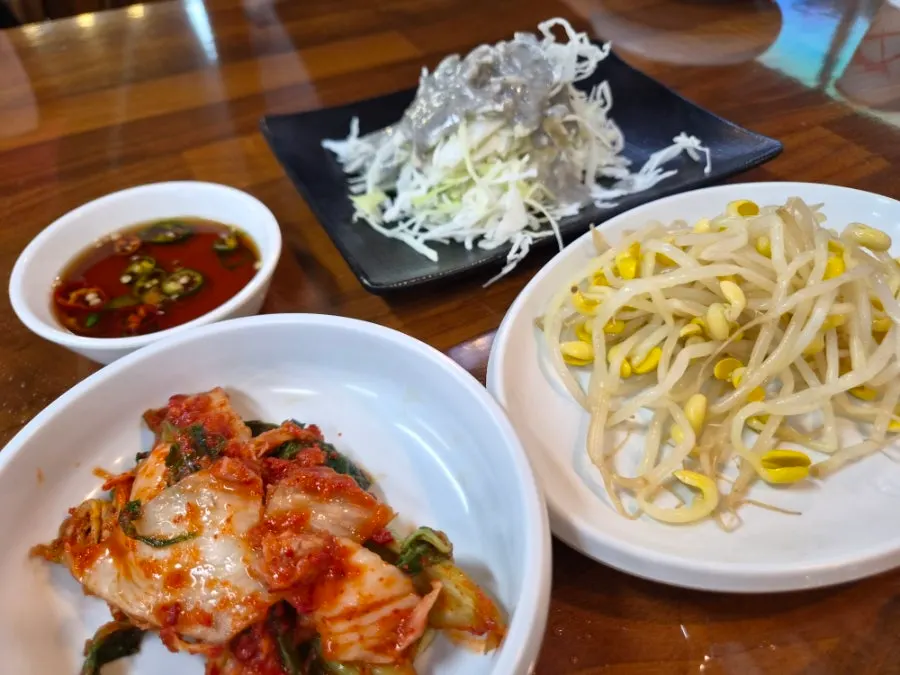 Table filled with self-serve side dishes