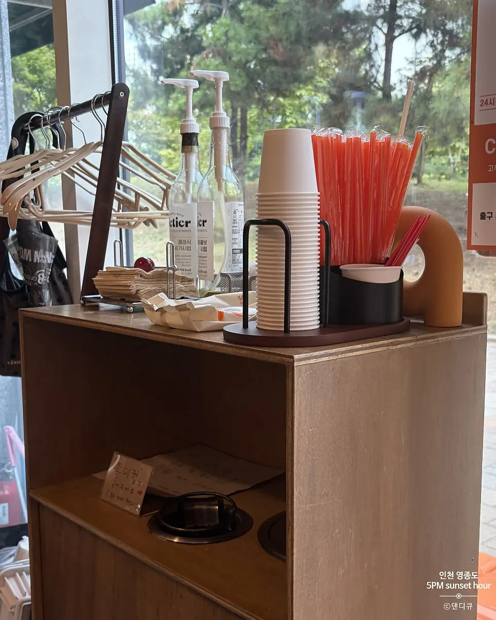 Narrow interior space between the counter and tables