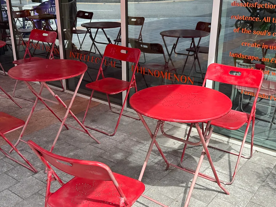 Terrace at 5PM sunset hour with an outdoor café atmosphere