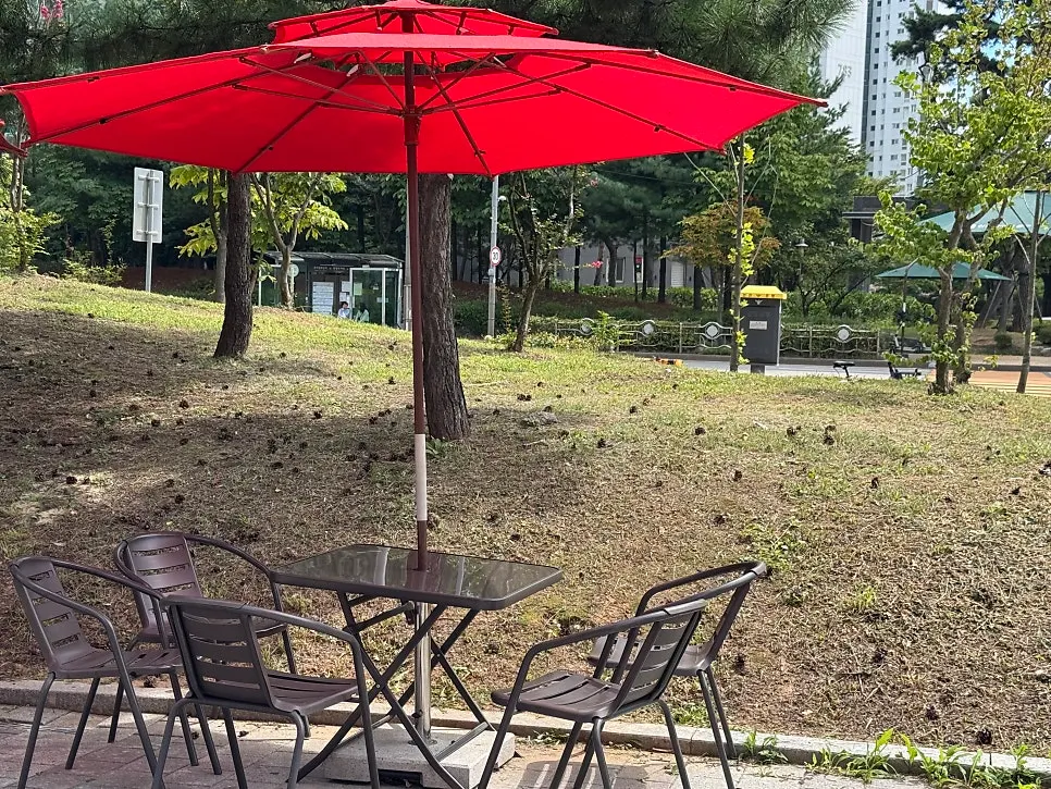 Outdoor tables and chairs with red color accents