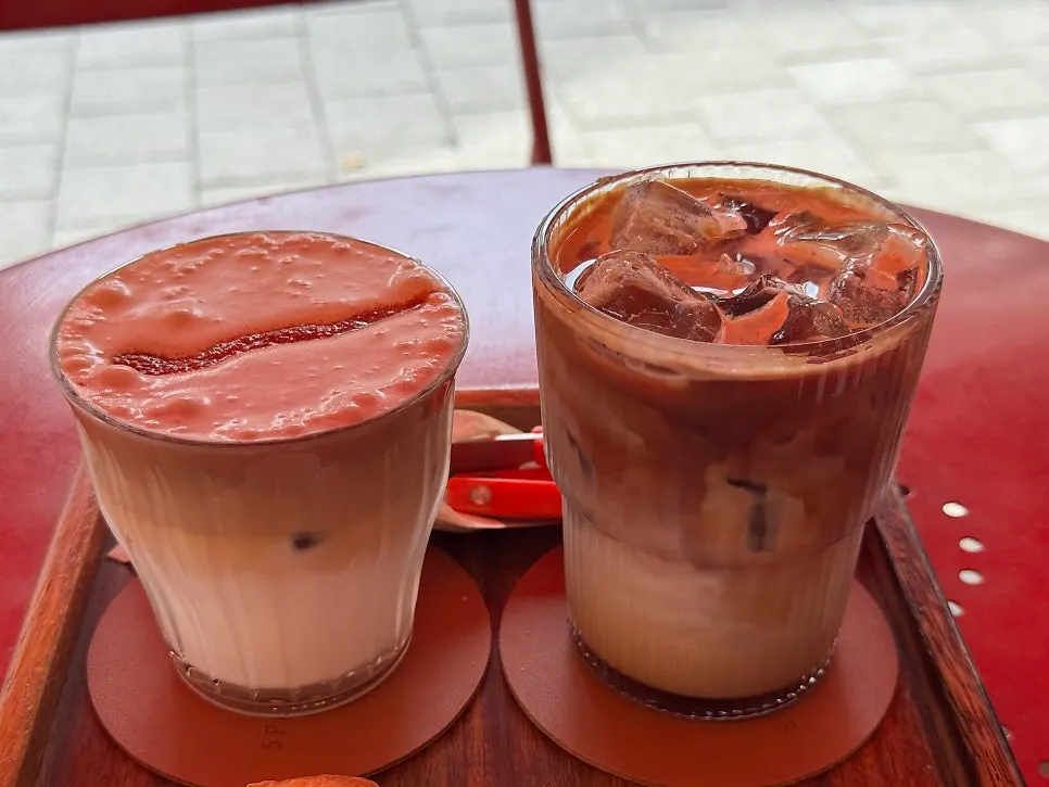 Two cups: caffe latte and butterscotch latte