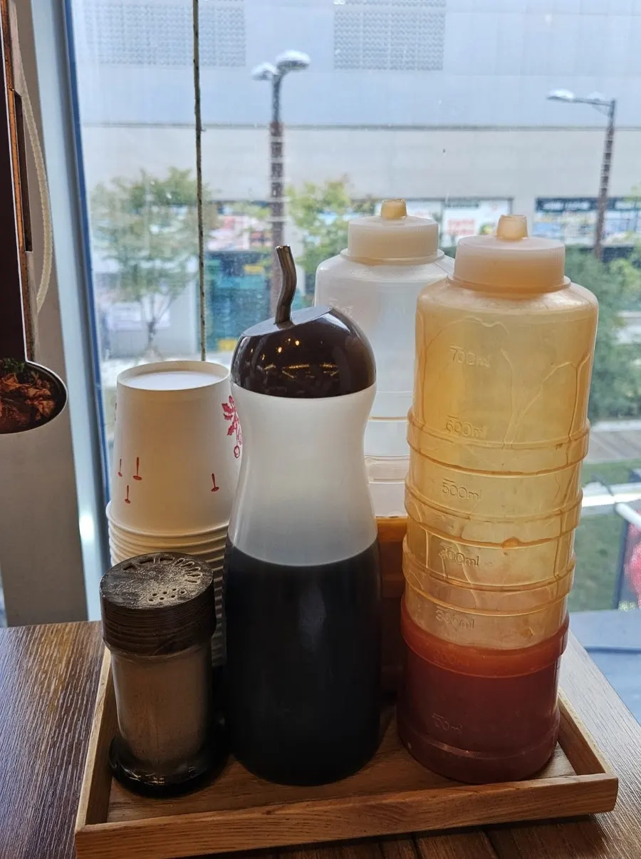 Cypress-steamed meat sauces set out on the table