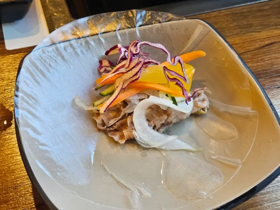 Vietnamese rice-paper roll filled with meat and vegetables