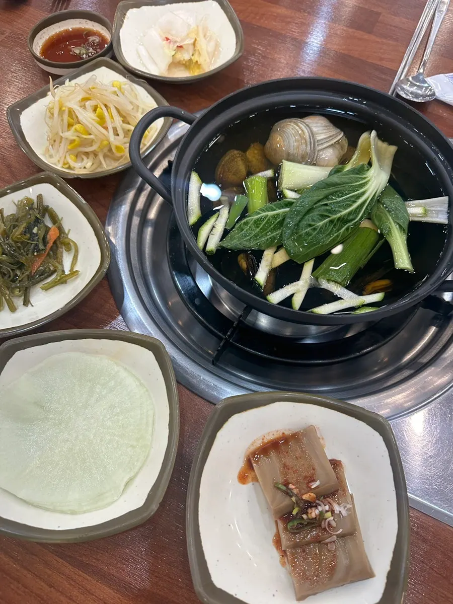 Side dishes set out after ordering the couple set