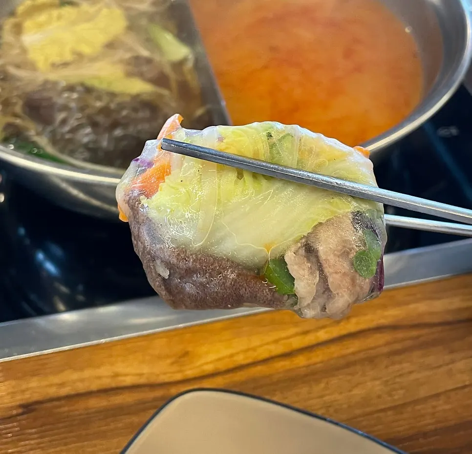 Vietnamese rice-paper roll with meat and vegetables