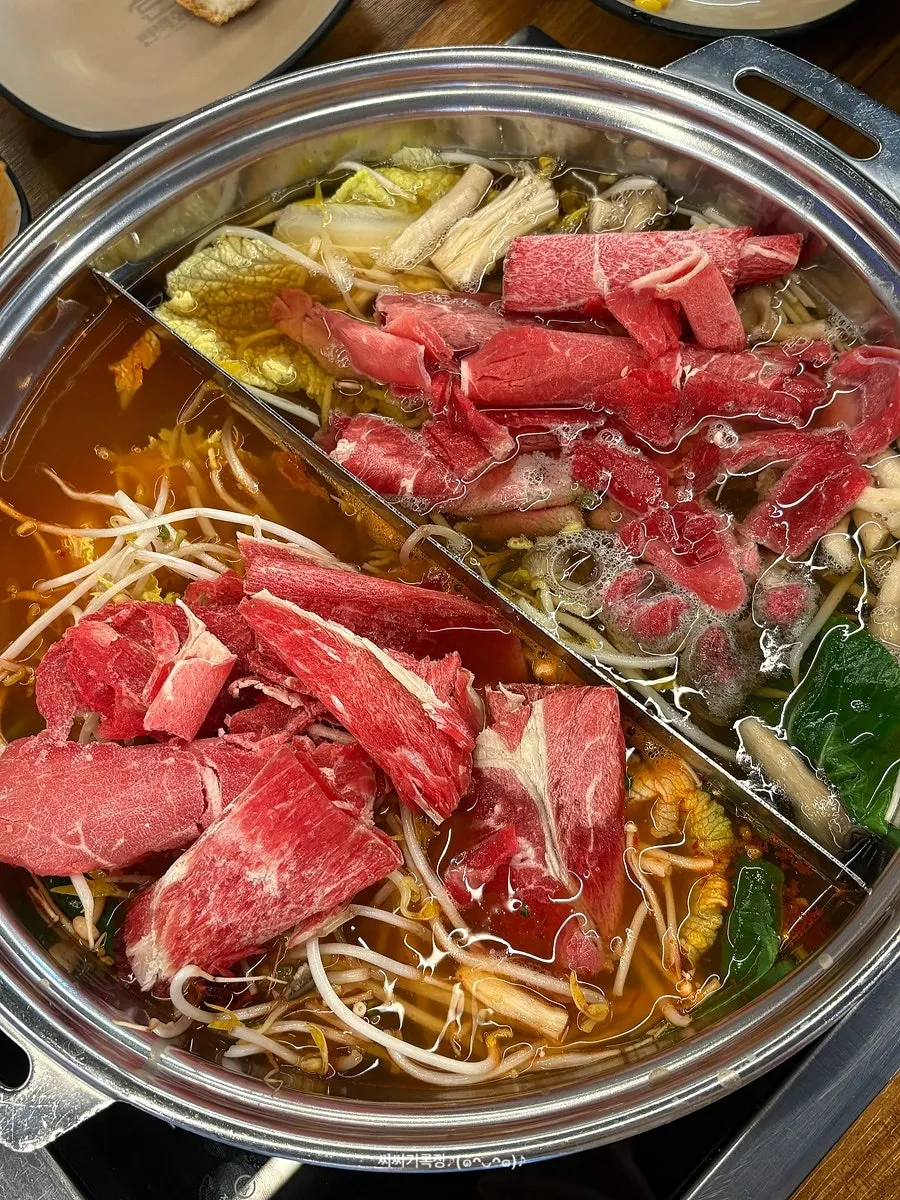 A full spread of shabu-shabu at Pyeonbaek Hoegwan Main Branch in Yeongjong