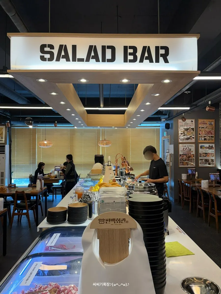 All-you-can-eat salad bar set up in the center of the restaurant