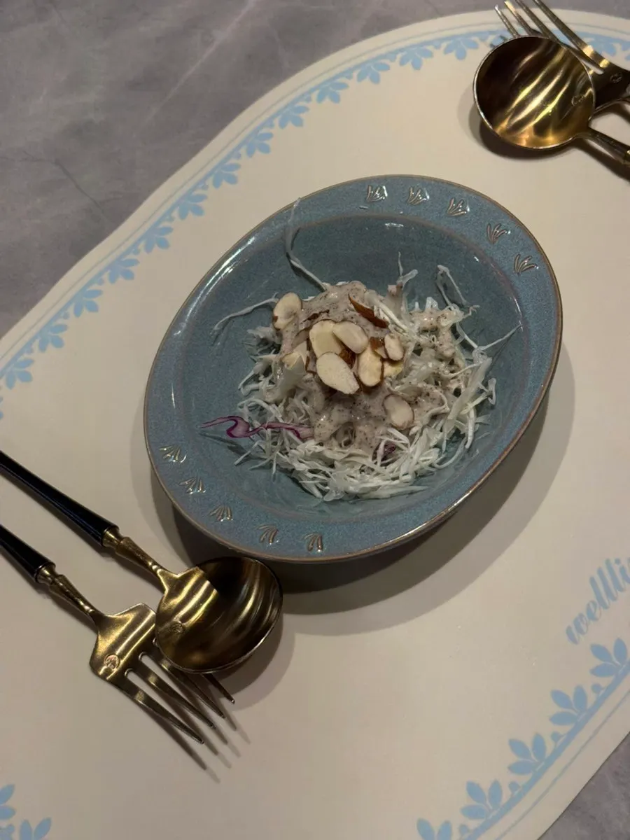 Pre-meal salad served in pretty tableware