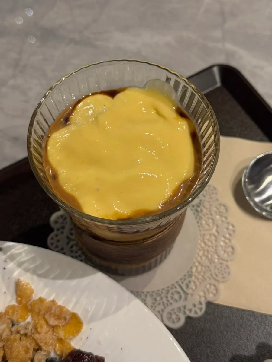 A cup of Café289's signature mango coffee