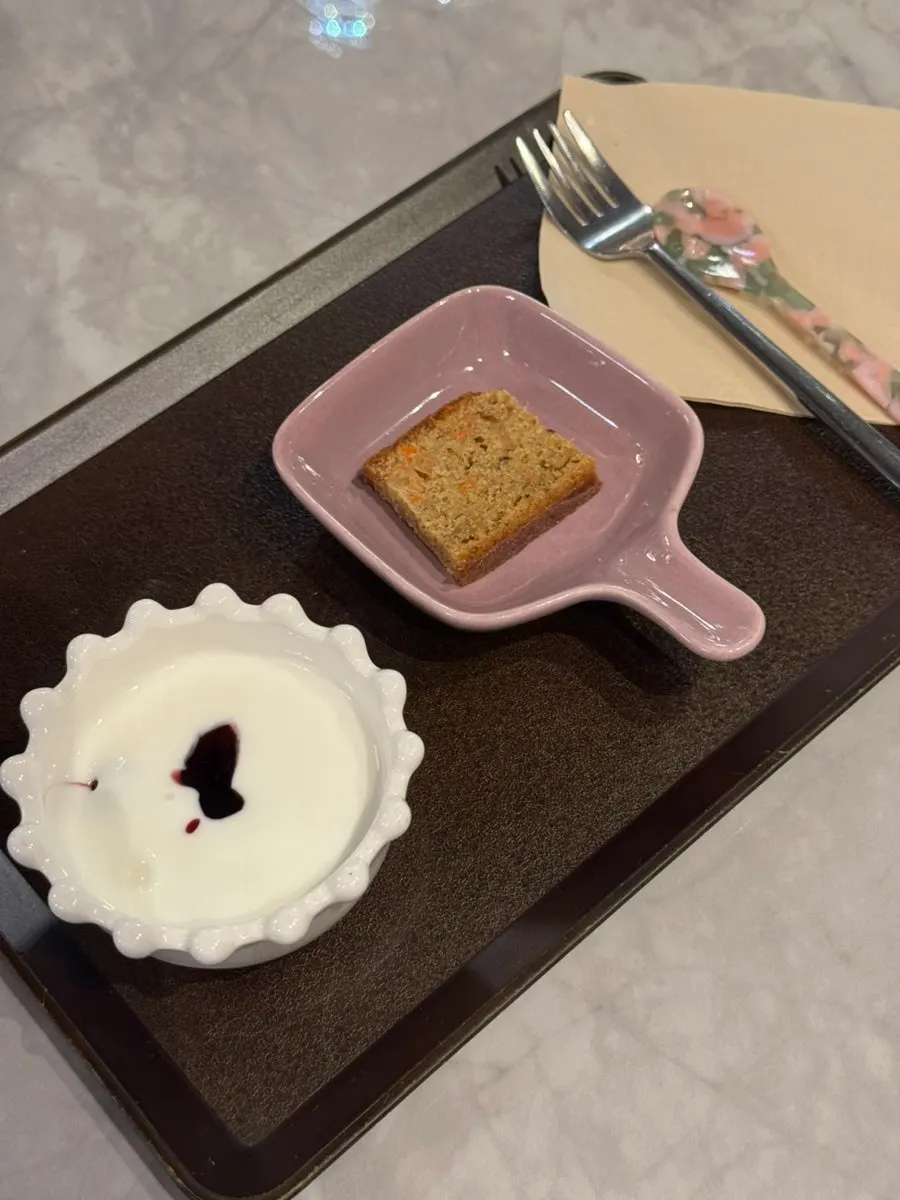 Carrot cake dessert served with the pasta order
