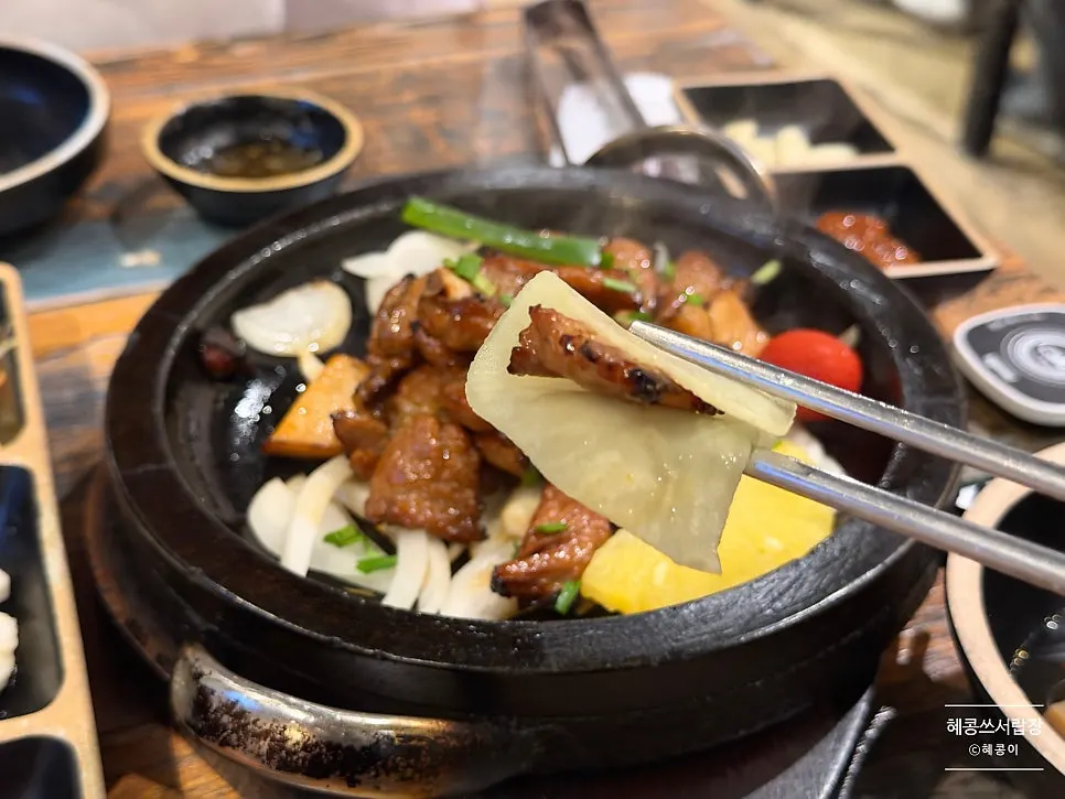 Seokgalbi eaten with ssammu radish wrap