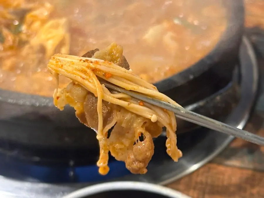 Small portion of Korean beef gopchang jeongol simmering