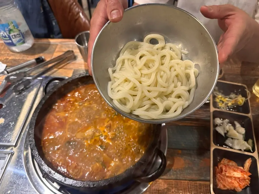 Pot of gopchang jeongol with the broth reduced