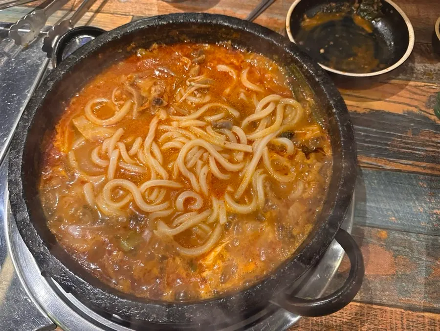 Hotpot with udon noodles added after the broth refill