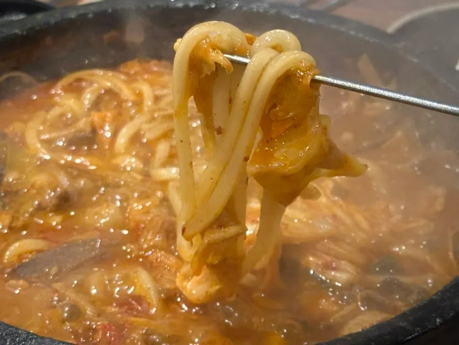 Udon gopchang hotpot with kimchi added in